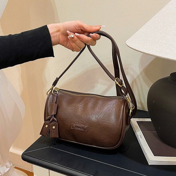 129.9USD--Charming, Fashionable and Soft Shoulder Bag-The prices of three bags